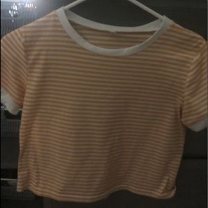 a yellow and white striped shirt